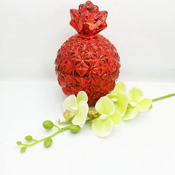 red glass jar with lid